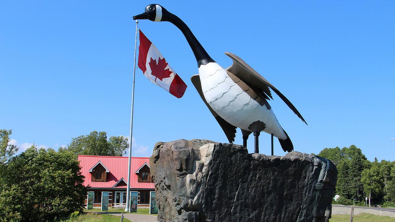 The giant Wawa Goose monument standing on its rock base beside the Trans-Canada Highway