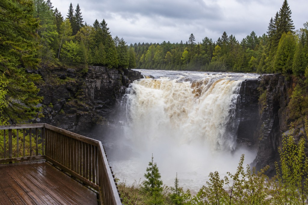 Scenic High Falls thundering over rock on the Magpie River near Wawa in spring flow